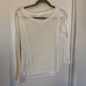 White, long sleeve shirt.